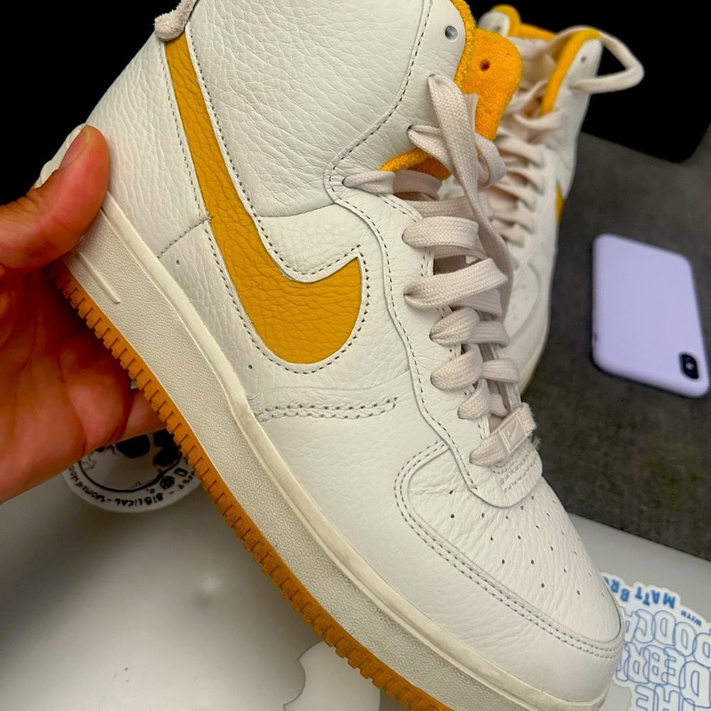Women’s 9.5 High Top Air Force 1s.